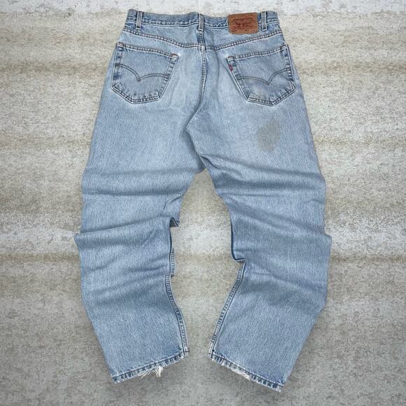 Vintage Levis Jeans 550 Relaxed Fit Light Wash Denim Red Tab 100% Cotton 90s